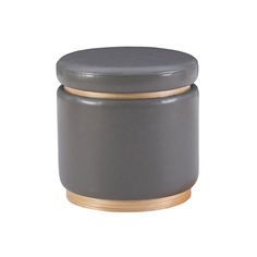 a grey stool with gold trim around it