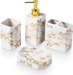 marble bathroom accessories set with gold accents on the top and bottom, including soap dispenser