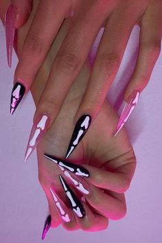 These Black Halloween Nails Are Blowing Up on Pinterest! Make your Holloween Nails unforgettable! Get ready to be inspired by these stunning Black Halloween Nails that are perfect for the spooky season! From Pink Halloween Nails and Purple Halloween Nails to fun Pumpkin Nails, these designs will elevate your nail game. Try out creative Halloween Press On Nails or go for intricate Nail Art Halloween featuring Bat Nails. Whether you’re looking for Cute Halloween Nails or bold Halloween Acrylic ... Spooky Goth Nails, Halloween Stilleto Nails, Goth Halloween Nails, Paznokcie Hello Kitty, Acrylic Nails Stiletto, Bat Nails, Halloween Acrylic