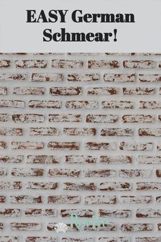 an old brick wall with the words easy german schmear