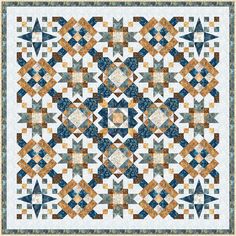 a blue and brown quilt with an intricate design on the front, along with two rows of smaller squares