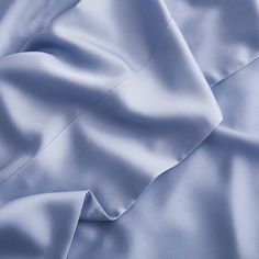 close up view of blue satin fabric