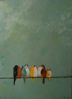 five birds are sitting on a wire together