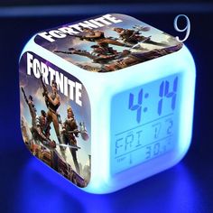 the fortnite alarm clock is lit up and ready to be used as an alarm clock