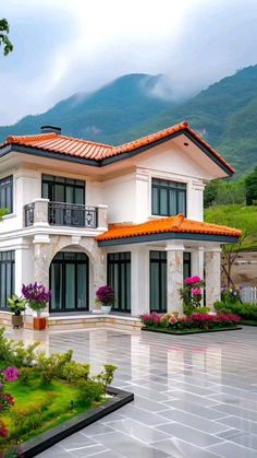 a large white house with orange tiled roof