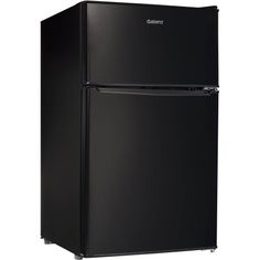 a black refrigerator freezer sitting on top of a white wall