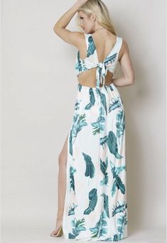 This sexy beach maxi dress features a plunge neckline,sleeveless, floral print all over, open back, bow tie design, splits all the way up perfect with a bikini or swimsuit for a walk on the beach measures about 50 inches long 92% Polyester 8% spandex Small Size 4-6 Backless Maxi Dress For Brunch During Beach Season, V-neck Beach Dress With Tie Back, Spring Beach Maxi Dress With Cutout Back, Beach Season Tie Back Maxi Dress For Brunch, Beach Season Tie-back Maxi Dress For Brunch, Vacation Backless Maxi Dress With Cutout Back, Backless Cutout Back Maxi Dress For Vacation, Summer Beach Swimwear With Cutout Back, Summer Beach Maxi Dress With Cutout Back