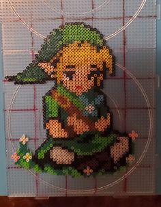 an image of the legend of zelda on a piece of art made out of perler beads