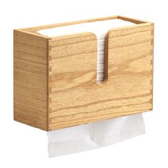 a wooden tissue dispenser with white napkins in it on a white background