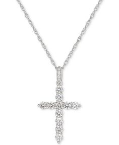 Have faith and let your spirit shine with this pretty cubic zirconia cross pendant necklace. Classic Cubic Zirconia Cross Necklace, Classic Macy's Necklace With Cubic Zirconia, Classic Macy's Necklace In Cubic Zirconia, White Gold Cubic Zirconia Cross Pendant Necklace, Diamond White Cubic Zirconia Cross Pendant Necklace, Wedding Jewelry: Cubic Zirconia Cross Pendant, White Cubic Zirconia Cross Pendant Jewelry, Luxury Diamond-accented Cross Pendant Necklace, Sterling Silver Cross Pendant