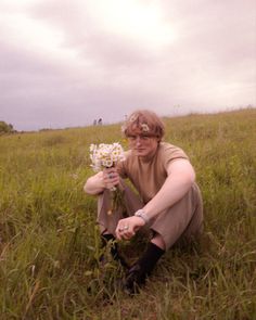 Spring, men, vintage, flowers Giving Flowers Pose Reference, Guy Picking Flowers, Happy Man Aesthetic, Man In Flower Field, Flower Crown Pose Reference, Person Picking Flowers, Male Gardener Aesthetic, Spring Aesthetic Outfit Men, Boy With Flowers Aesthetic