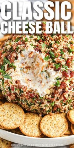 a cheese ball on top of crackers with the words classic cheese ball above it