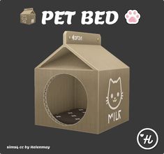 a cardboard box with a cat in it and the words pet bed written on it