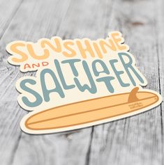 a sticker with the words sushi and salter on it sitting on a wooden surface