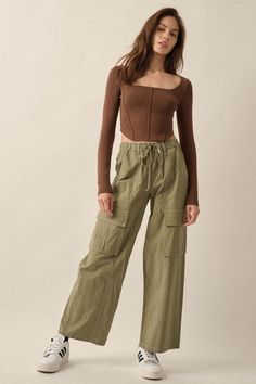 Solid twill pants.Drawstring elastic waist.Side pockets.Flap cargo pockets.Contrast stitching throughout.Ankle length.Wide leg.Relaxed fit.100% Cotton.Imported. Designed in LA.Model wears size S. Keep It Real, Twill Pants, Iron Decor, Contrast Stitch, Ankle Length, Cargo Pants, Elastic Waist, Wide Leg, Stitching