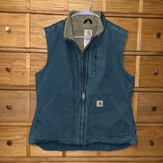 Rare Vintage Teal Carhartt Women’s Mock Neck Vest Built To Last For A Few Generations! Nice Fade And Broken In With Tons Of Life Left For You, Your Daughters Or Granddaughters To Enjoy! What An Amazing Legacy! Excellent Condition! Steam Sanitized For Your Peace Of Mind! Carhartt Vest Outfit Woman, Womens Carhartt Vest, Carhartt Vest Outfit, Ariat Vest, Vest Outfit Women, Womens Carhartt, Carhartt Vest, Carhartt Jackets, Sherpa Vest