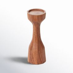 a wooden candle holder on a white background