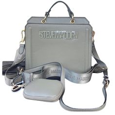 Steve Madden Satchel Bevelyn Crossbody Purse Steve Madden Tiktok Viral Bag Bevelyn Bag Brand New, With Tags 100% Authentic Color: Gray With Silver Hardware Dimension: 9" Wide, 8" Tall, 4.25 Deep Crossbody With Detachable Guitar Strap Flap Snap Closure And Zipper Airpod Case / Coin Purse See My Other Listings For Matching Wallets And Other Steve Madden Bags! Tags: Viral Steve Madden Tik Tok Crossbody Bag Purse , Bevelyn Bag , Bbabi , Bhardyy , Bswpeedy Luggage , Beverlyn Purse , Bwebber , Bmatty Steve Madden Backpack, Steve Madden Purse, Pink Crossbody Bag, Tiktok Viral, Fur Bag, Black Crossbody Purse, Steve Madden Bags, Vegan Leather Bag, Crossbody Wallet