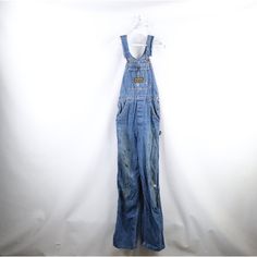 Vintage 50s 60s Womens 26 Thrashed Sanforized Cotton Flared Denim Overalls Usa Womens Overalls Thrashed. Distressed And Faded. Has Stains All Over. Usa Made Womens 26 Measurements Are: 13.5 Inches Across The Waist 34 Inch Inseam 61.5 Inches From Top To Bottom 9.75 Inch Leg Opening Blue Cotton Check Out My Other Items In My Store! I272 Blue Pre-washed Fitted Jeans, Retro Fitted Overall Bottoms, Retro Fitted Overalls, Vintage Cotton Denim Jumpsuit In Medium Wash, Vintage Denim Blue Overalls, Vintage Medium Wash Overalls, Vintage Fitted Cotton Jeans, Vintage Dark Wash Overalls, Fitted Blue Denim Retro Jumpsuit