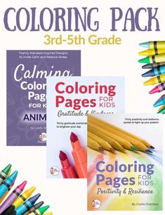 coloring books and markers for kids with colored pencils on the cover, in front of them