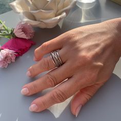 Discover timeless elegance with our Chunky Silver Thumb Ring. Crafted for the modern woman, this multi-layered signet ring is the ultimate expression of unique style. It's not just jewelry; it's a statement.  A perfect Christmas gift for her, this open adjustable ring adds a touch of sophistication to any ensemble.  Embrace individuality and shop now to give her a gift she'll treasure forever.  Order now and make a fashion statement that reflects your individuality! ----------------------------------------------------🧡 SAME DAY SHIPPING  ----------------------------------------------------🧡 SIZE: Adjustable ADJUSTABLE  size range: UK M/US 6 - UK S/US 10 MATERIAL: 925 Sterling Silver Plated Bronze HYPOALLERGENIC %100 NICKEL AND LEAD FREE TARNISH FREE WATERPROOF --------------------------- Elegant Stacked Rings As A Gift, Modern Stacked Rings For Gifts, Stacked Rings For Anniversary, Elegant Stackable Rings As Gift, Minimalist Stacked Rings For Anniversary, Modern Stacked Rings As Gift, Elegant Gift Stackable Rings, Minimalist Stacked Anniversary Rings, Thumb Rings Silver