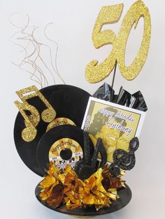 MOTOWN 50TH BIRTHDAY CENTERPIECE - DESIGNS BY GINNY Record Centerpiece, Moda Disco, Music Centerpieces, 50th Birthday Centerpieces, Disco Party Decorations