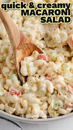 macaroni salad in a white bowl with a wooden spoon on top and text overlay reading quick & creamy macaroni salad