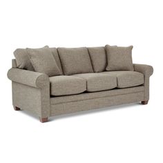 an image of a couch with pillows on the top and bottom half, in beige linen