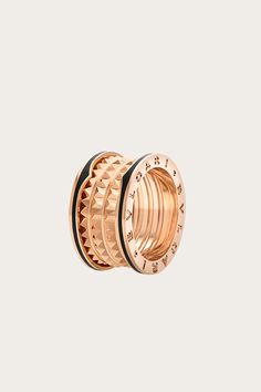 B.zero1 Rock four-band ring in 18 kt rose gold with studded spiral and black ceramic inserts on the edges.  $2,400.00 Chanel Costume Jewelry, Black Ceramic, Band Ring, Official Store