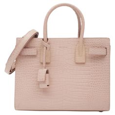 This mini tote is made of light rose beige crocodile embossed leather and features rolled leather top handles, a long crossbody shoulder strap with polished silver hardware and cinch straps for the expandable sides. The top is open to a smooth matching leather interior with a removable central zipper pocket. Retail Authenticated by entrupy. Color: rose pink Material: croc embossed leather Model No. 421863 Comes with: lock and key Condition: Very good. Light discoloration and faint marks. Made in Sac Louis Vuitton, Leather Baby, Saint Laurent Paris, Pink Interior, Saint Laurent Bag, Mini Tote, Pink Beige, Vintage Logo, Hermes Birkin