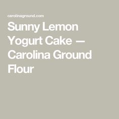 the words sunny lemon yogurt cake are in white font on a gray background