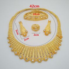 Dubai Gold Color Jewelry Sets For Women Big Necklace African Jewelry Set Women Italian Bridal Jewelry Sets Wedding AccessoriesModel Number:33029996241 Material: Austrian Crystal, Gold Filled Necklace length: about 42cm Bracelet length: about 18cm The ring diameter: Adjustable Quantity: 1 Set (Neckace+Bracelet+Earrings+Ring ) Condition: 100% Brand New Elegant Alloy Bridal Necklace For Wedding, Elegant Gold Bridal Necklace For Wedding, Alloy Costume Jewelry Necklaces For Wedding, Wedding Round Alloy Necklace, Alloy Rhinestone Necklace For Wedding, White Alloy Necklace For Wedding, White Necklace For Wedding, Wedding Metal Plated Necklaces, Round Rhinestone Metal Necklace For Wedding