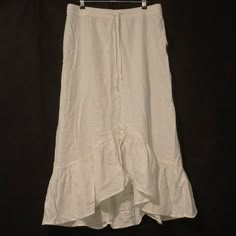 Anne Klein Skirt. White. Linen Blend. Midi Length. Tulip Ruffle Hem. Elastic Tie Waist. Women’s Size Small. New With Tags. Approximate Measurements: Waist: 16 Inches (Flat Lay Not Stretched) Waist To Hem Length: 32 Inches Please Check Out The Photos For More Details On The Item. If You Have Any Questions, Please Ask Prior To Purchase. Also, All Items Are Coming From A Clean Smoke Free Home. Silver Skirt, Tulip Skirt, Knee Skirts, Elastic Waist Skirt, Wool Wrap, Stretch Skirt, Tweed Skirt, Midi Skirt Pencil, Skirt White