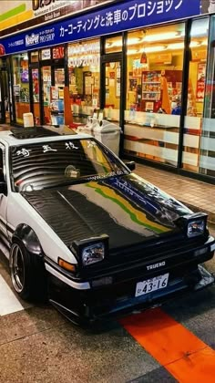 a car parked in front of a store