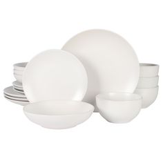 white dishes are stacked on top of each other