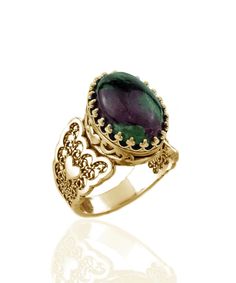 Make a statement with Filigranist's Gold Plated Sterling Silver Filigree Art Double Heart Detailed Ruby Zoisite Gemstone Women Statement Ring. This stunning piece of jewelry is the perfect addition to your collection, adding a touch of elegance and glamour to any outfit. Made from high-quality gold plated sterling silver, the ring features a beautiful Ruby Zoisite gemstone decoration and is stamped with the brand's logo. The intricate filigree design of the ring, coupled with the double heart de Birthday Gemstones, Lapis Lazuli Gemstone, Art Gold, Ruby Zoisite, Statement Ring Silver, Sterling Silver Filigree, Filigree Design, Purple Stones, Double Heart