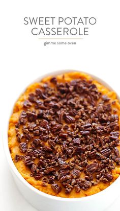 sweet potato casserole with pecans in a white bowl on a white background