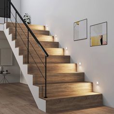 the stairs are made of wood and have lights on them