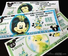 three mickey mouse money bills sitting on top of each other