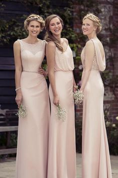 the bridesmaids are posing for pictures in their dresses