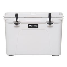 the yeti cooler is white with black handles