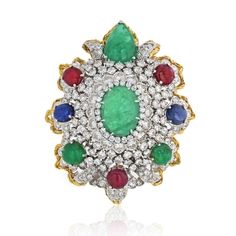 An impressive diamond and gemstone Heraldic Brooch from 1970's. Set with cabochon emeralds, rubies, and sapphires, brilliant-cut diamonds, 18K gold, and platinum.Center Diamond Weight: 1.10Measurements: L: 2.5 inches (approx.)Metal Type: Platinum & 18K Yellow GoldMetal Weight: 58.7 gr.Signed: WEBBCondition: Good.Stock: RR6197 Diamond Multi-stone Brooches In Fine Jewelry Style, Fine Jewelry Diamond Multi-stone Brooch, Fine Jewelry Diamond Multi-stone Brooches, Multi-stone Diamond Brooches, African Inspired Jewelry, Emerald Cut Diamond Ring, David Webb, African Jewelry, Exclusive Jewelry