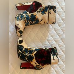 Beautiful Floral Boot. 4.25” Heel. Worn Once. Selling Because They Are Way Too High For Me. Box And Dust Bag Included. Elegant Spring Boots With Red Sole, Luxury Floral Print Heels For Formal Occasions, Designer Floral Print Heels For Formal Occasions, Floral Boots, Louboutin Shoes, Christian Louboutin Shoes, Bootie Boots, Christian Louboutin, Dust Bag