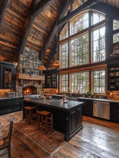 a large kitchen with an island in the middle and lots of wood on the walls