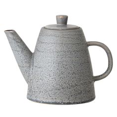 a gray tea pot with a lid and handle is shown on a white background, it appears to be made out of ceramic