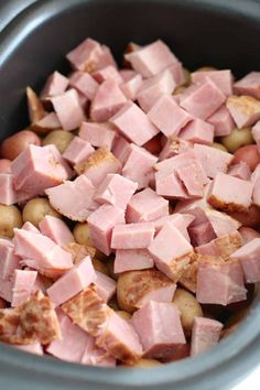 ham and chickpeas in a crock pot ready to be cooked for dinner