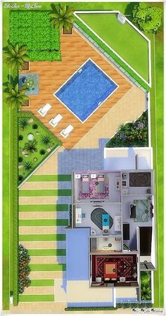 an aerial view of a house with a pool in the middle and landscaping around it