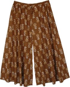 A bohemian streetwear cotton palazzo pants in a charming brown floral print.  These pants have a wide-leg style construction that gives them an extra flowy look. #tlb #SplitSkirtsPants #XLPlus #Printed #bohemianfashion #plussizecottonpants #plussizehippieclothing Hippie Style Wide Leg Brown Bottoms, Brown Wide Leg Hippie Bottoms, Bohemian Wide Leg Floral Print Cotton Pants, Bohemian Brown Wide Leg Pants For Spring, Bohemian Brown Wide Leg Bottoms, Brown Bohemian Long Skirt, Boho Print Wide Leg Cotton Bottoms, Wide Leg Boho Print Cotton Bottoms, Wide Leg Cotton Bottoms With Boho Print