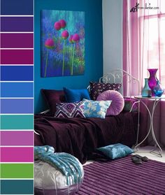 a bedroom with blue, purple and green colors on the walls is shown in this image