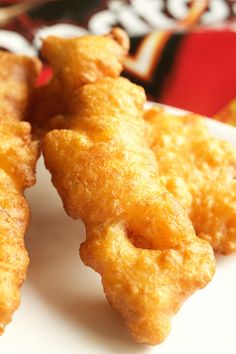 some fried food is on a white plate